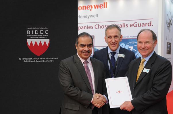 His Excellency Shaikh Fawaz bin Mohammed Al Khalifa, The Ambassador of the Kingdom of Bahrain to the Court of St James shakes hands with Rear Admiral Simon Williams OBE, Chairman of Clarion Defence & Security with Tim Porter, Managing Director of Clarion Defence & Security in attendance after the announcement of BIDEC 2016.